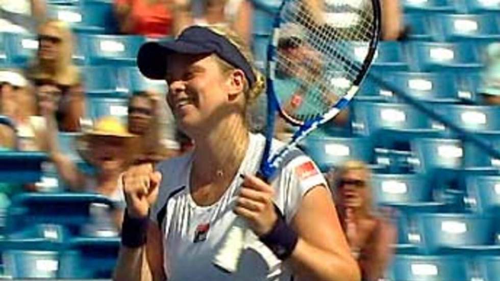 Clijsters qualifiée pour les quarts, les sœurs Williams sur le carreau