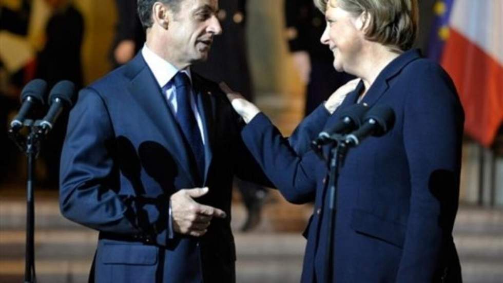 Sarkozy et Merkel accordent leurs violons avant un Conseil européen chargé