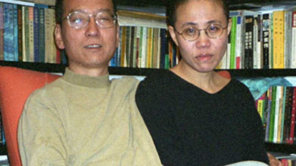 Le dissident Liu Xiaobo condamné à 11 ans de prison pour "subversion" Le dissident Liu Xiaobo condamné à 11 ans de prison pour "subversion"