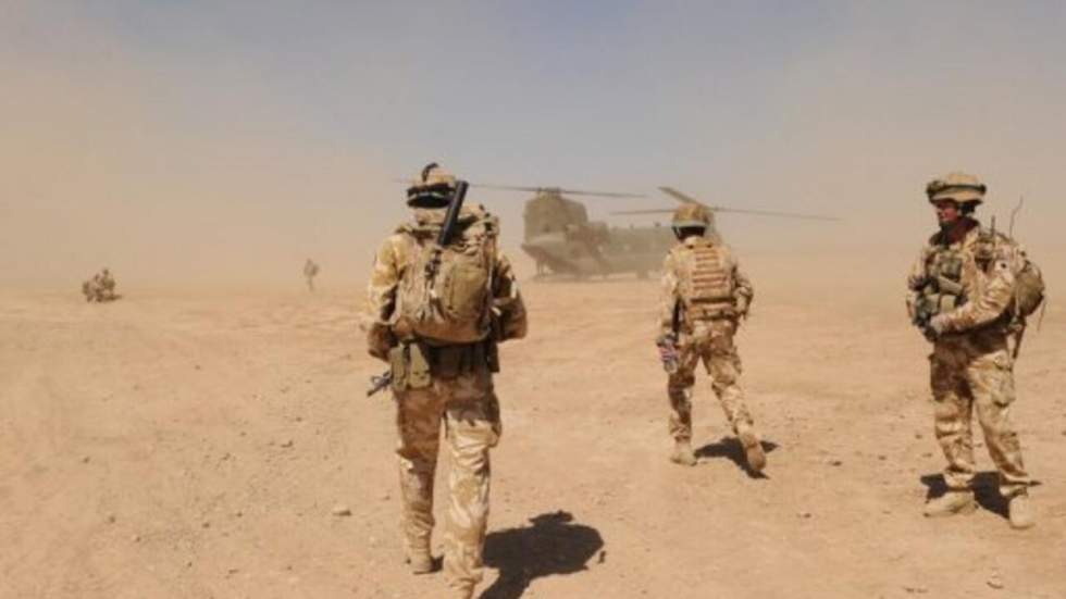 Les forces britanniques cèdent aux Américains le contrôle d'un bastion taliban Les forces britanniques cèdent aux Américains le contrôle d'un bastion taliban