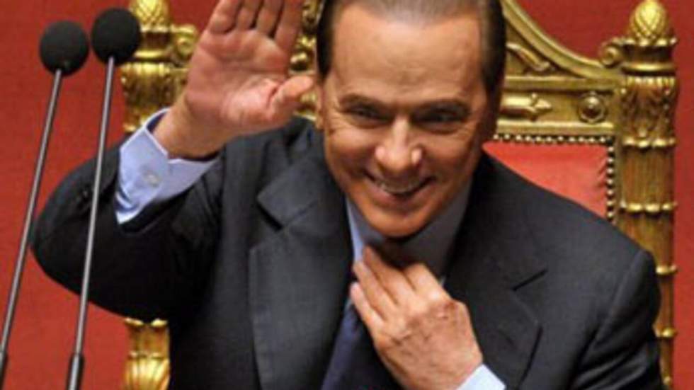 Berlusconi tente une ouverture au centre avant un vote de confiance décisif Berlusconi tente une ouverture au centre avant un vote de confiance décisif