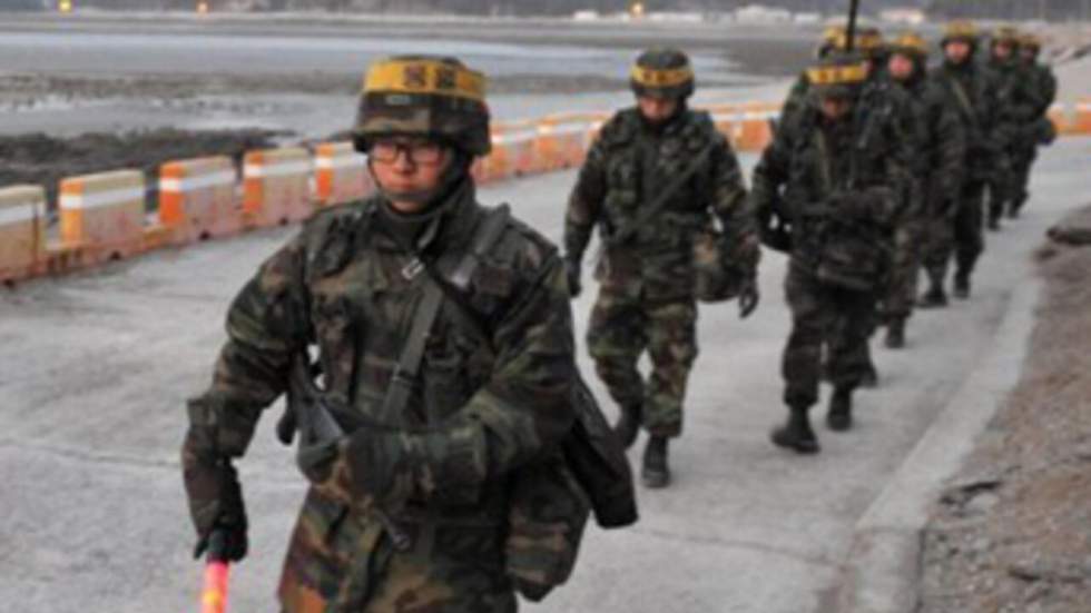 Séoul met fin aux exercices d'artillerie menés sur l'île de Yeonpyeong Séoul met fin aux exercices d'artillerie menés sur l'île de Yeonpyeong