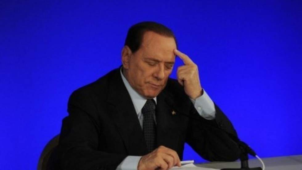 "Silvio Berlusconi joue une partie de poker"