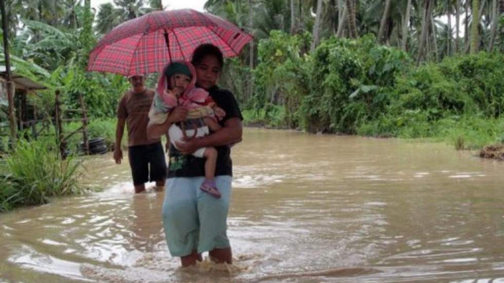 Le typhon Bopha fait au moins 239 morts aux Philippines Le typhon Bopha fait au moins 239 morts aux Philippines