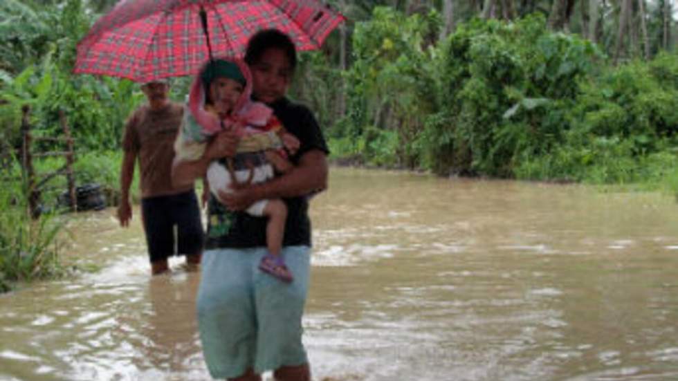 En images : le sud des Philippines devasté par le typhon Bopha En images : le sud des Philippines devasté par le typhon Bopha