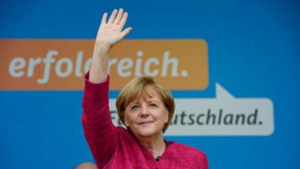 Législatives allemandes : le parti de Merkel frôle la majorité absolue