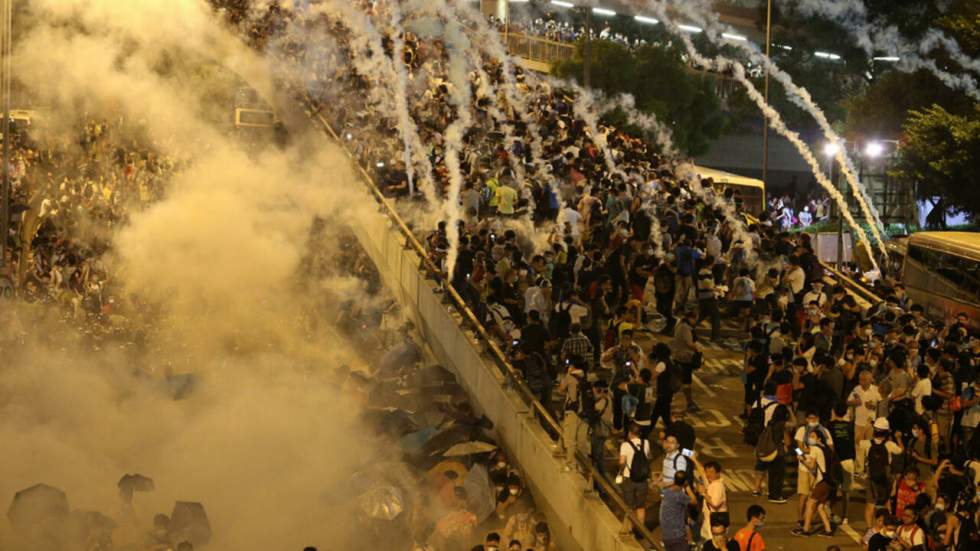 En images : les manifestants bloquent Hong Kong pour faire plier Pékin En images : les manifestants bloquent Hong Kong pour faire plier Pékin