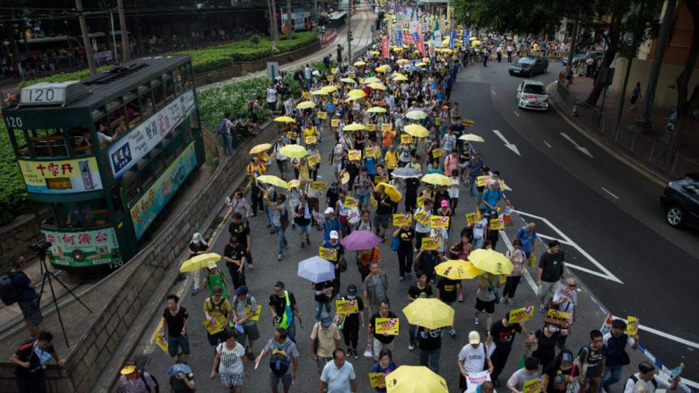 Faible mobilisation des pro-démocratie à Hong Kong avant le vote sur la réforme électorale Faible mobilisation des pro-démocratie à Hong Kong avant le vote sur la réforme électorale
