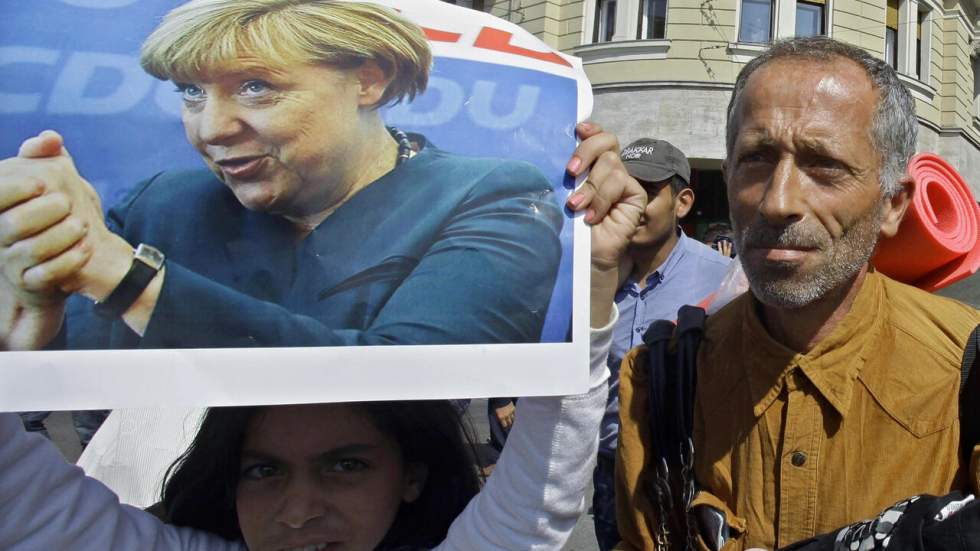 Angela Merkel, l'héroïne des réfugiés syriens sur le chemin de l'Europe Angela Merkel, l'héroïne des réfugiés syriens sur le chemin de l'Europe