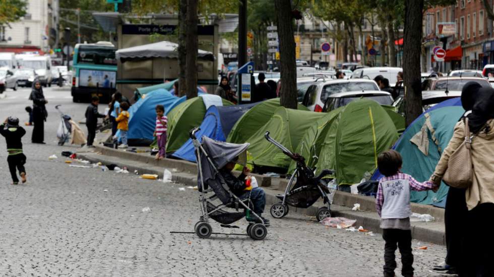 Camp de migrants syriens de la porte de Saint-Ouen : où en est-on ? Camp de migrants syriens de la porte de Saint-Ouen : où en est-on ?