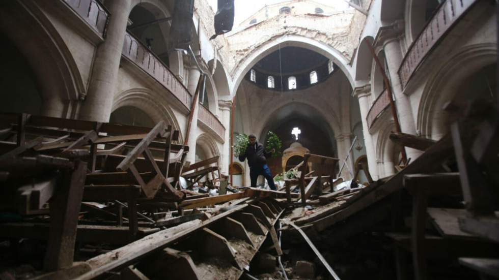 À Alep, les chrétiens célèbrent Noël dans leur église ravagée par la guerre