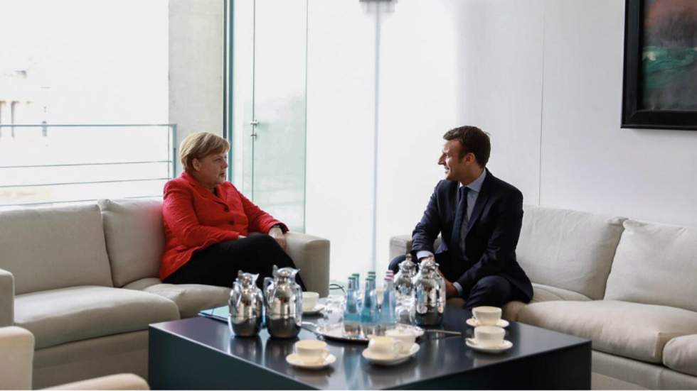 À Berlin, Emmanuel Macron rencontre la chancelière Merkel et se présente en champion de l'Europe