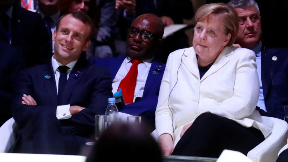 Forum de Paris : le plaidoyer de Merkel et Macron pour le multilatéralisme