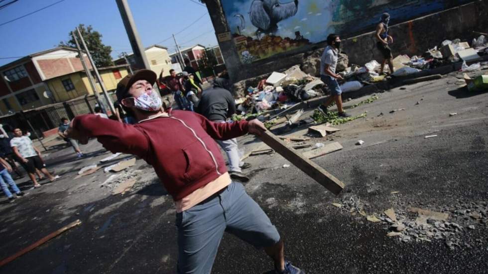 Au Chili, des émeutes de la faim explosent dans la banlieue de Santiago Au Chili, des émeutes de la faim explosent dans la banlieue de Santiago