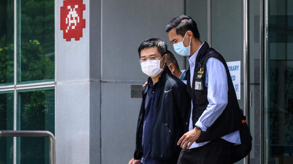 Hong Kong : deux responsables du quotidien Apple Daily inculpés Hong Kong : deux responsables du quotidien Apple Daily inculpés