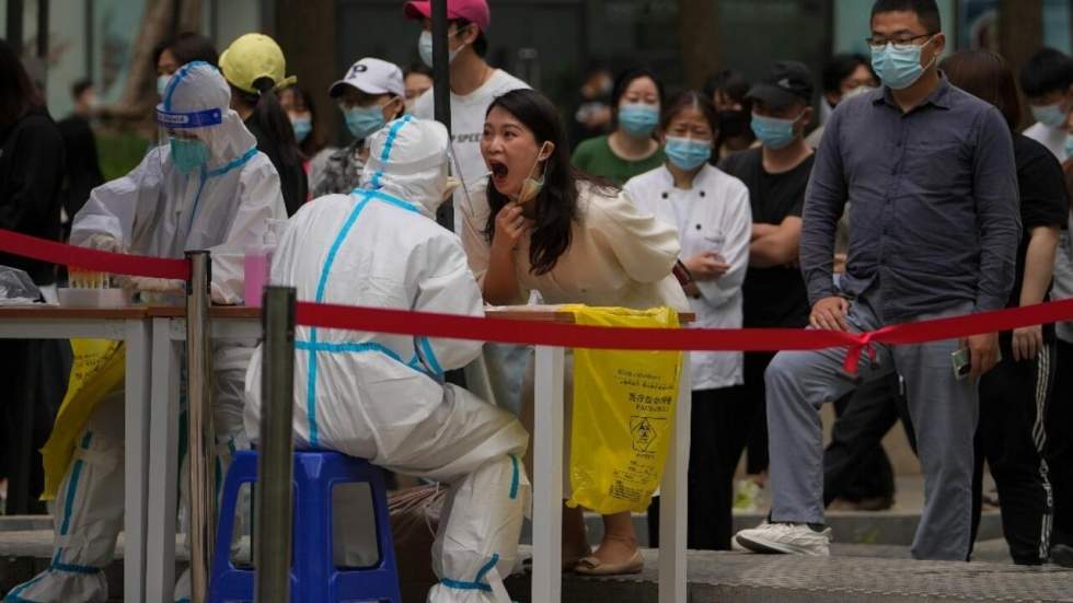 Covid-19 en Chine : en pleine flambée épidémique, Pékin sous la menace d'un confinement Covid-19 en Chine : en pleine flambée épidémique, Pékin sous la menace d'un confinement